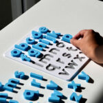 Sky blue lowercase alphabet puzzle for preschoolers – educational toy for early literacy and letter recognition.