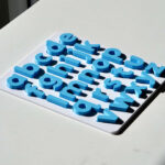 Sky blue lowercase alphabet puzzle for preschoolers – educational toy for early literacy and letter recognition.