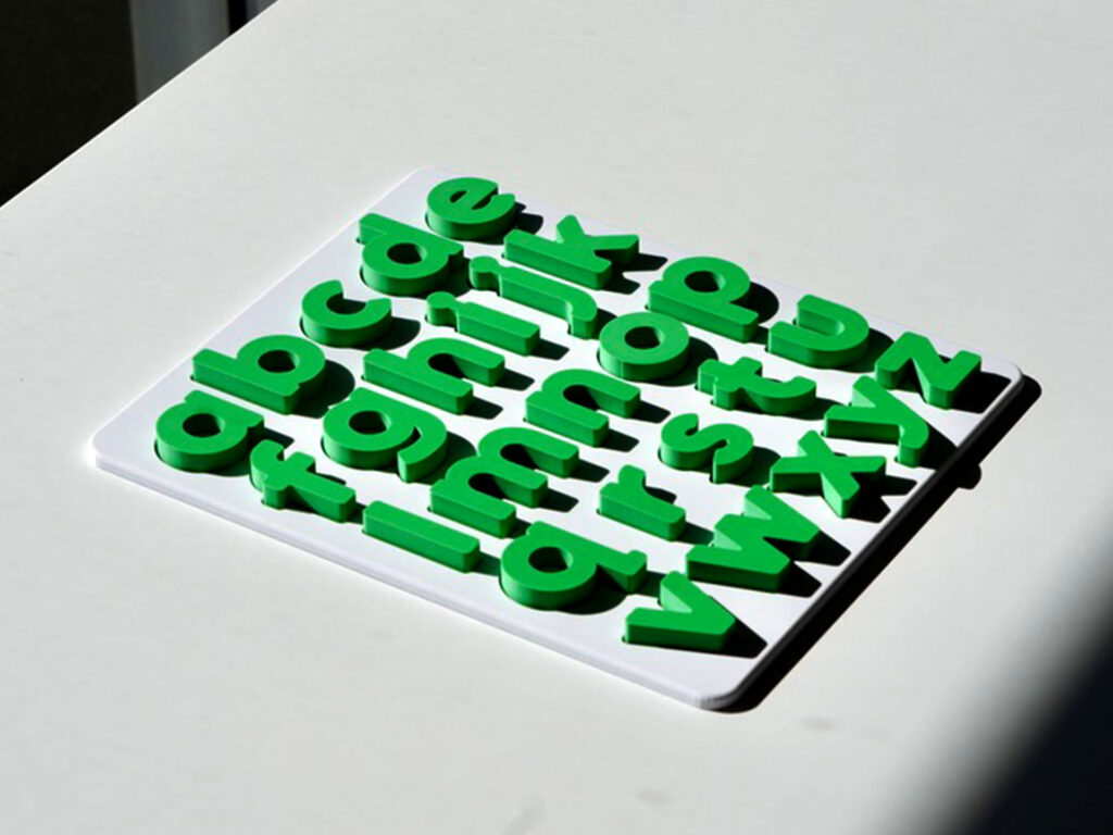 Grass green lowercase alphabet puzzle for preschoolers – educational toy for early literacy and letter recognition.