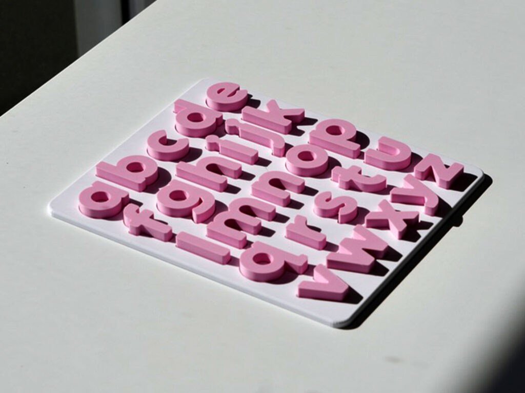 Montessori pastel lowercase alphabet puzzle for preschoolers – educational toy for early literacy and letter recognition.