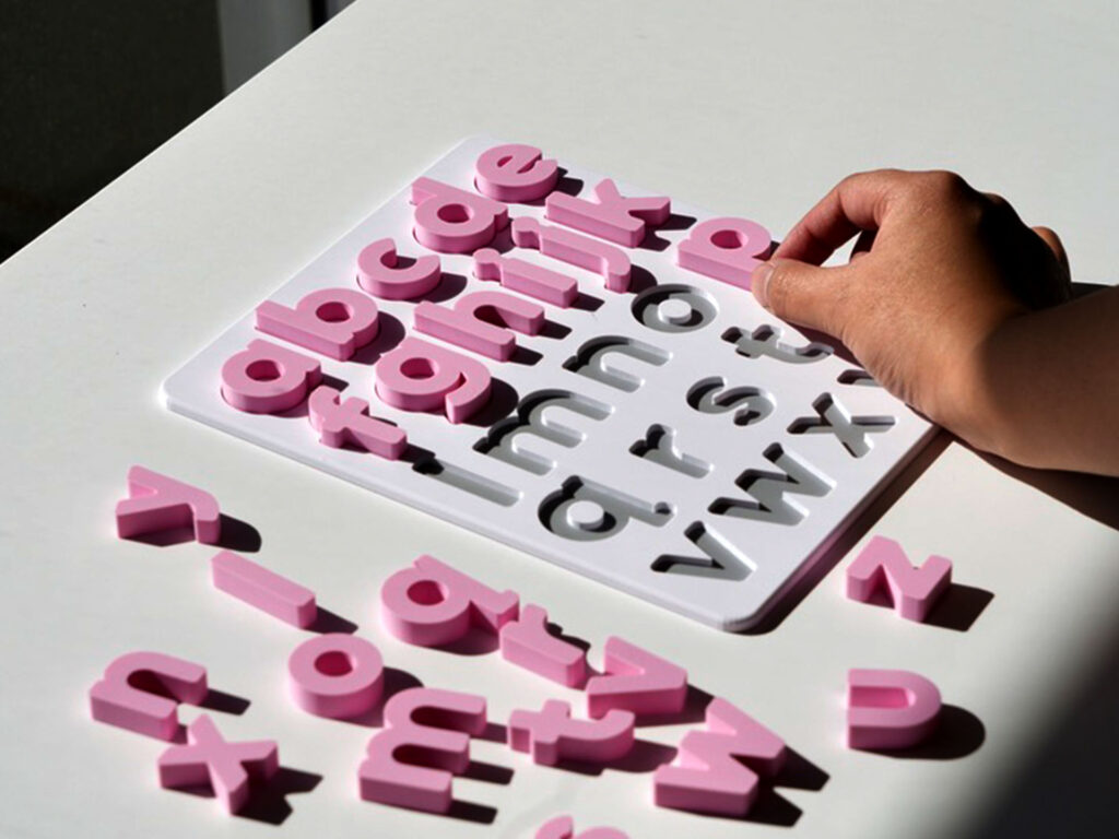Sakura pink lowercase alphabet puzzle for preschoolers – educational toy for early literacy and letter recognition.