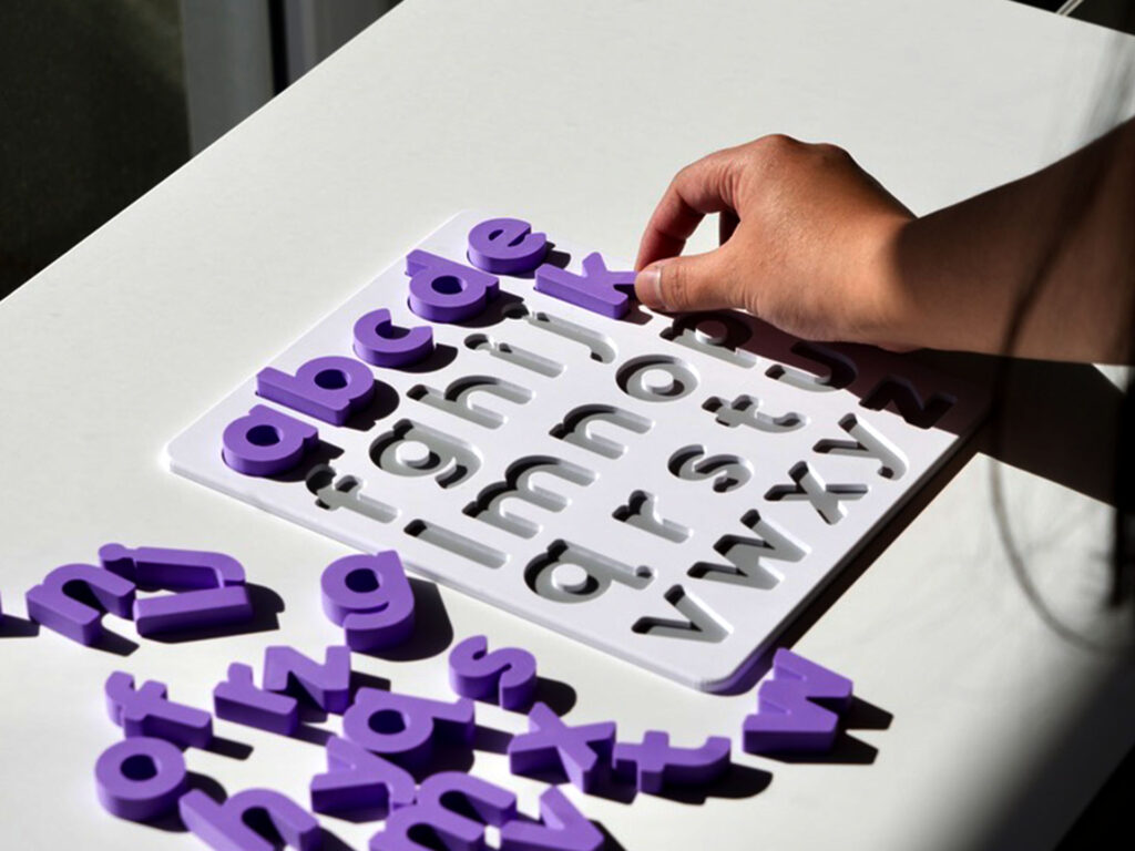 Soft Lilac lowercase alphabet puzzle for preschoolers – educational toy for early literacy and letter recognition.