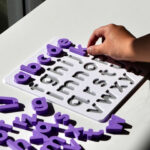 Soft Lilac lowercase alphabet puzzle for preschoolers – educational toy for early literacy and letter recognition.