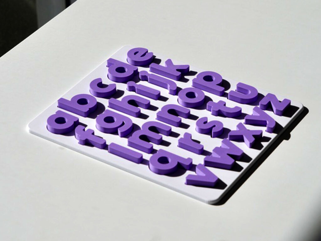 Montessori pastel lowercase alphabet puzzle for preschoolers – educational toy for early literacy and letter recognition.