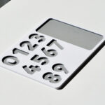 Blank number puzzle base with white and grey tones – Montessori-inspired educational toy for preschoolers.