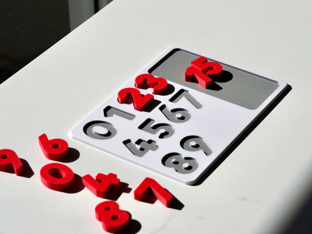 Number puzzle pieces scattered – hands-on counting toy promoting number recognition and early math skills.