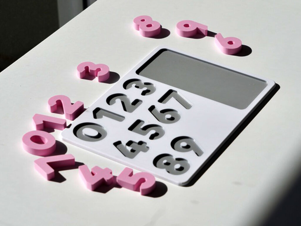 Number puzzle pieces scattered – hands-on counting toy promoting number recognition and early math skills.