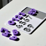 Number puzzle pieces scattered – hands-on counting toy promoting number recognition and early math skills.