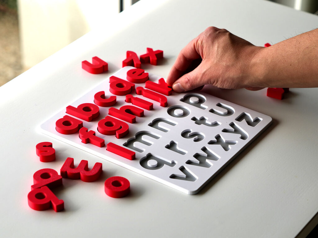 Royal Red lowercase alphabet puzzle for preschoolers – educational toy for early literacy and letter recognition.