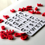 Royal Red lowercase alphabet puzzle for preschoolers – educational toy for early literacy and letter recognition.