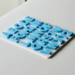 Completed uppercase alphabet puzzle – Australian-made educational toy for preschool letter recognition and phonics practice.