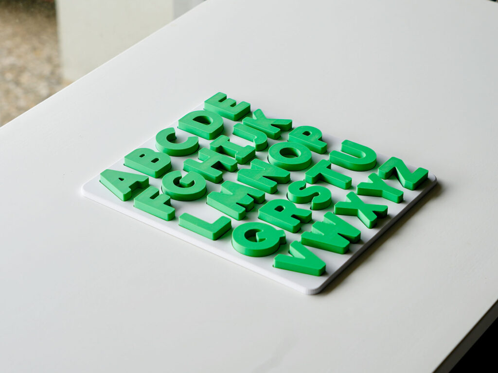 Completed uppercase alphabet puzzle – Australian-made educational toy for preschool letter recognition and phonics practice.