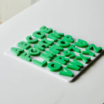 Completed uppercase alphabet puzzle – Australian-made educational toy for preschool letter recognition and phonics practice.