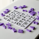 Uppercase alphabet puzzle with scattered letters – hands-on educational toy for letter recognition and early literacy skills.