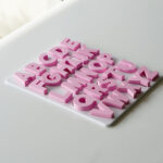 Completed uppercase alphabet puzzle – Australian-made educational toy for preschool letter recognition and phonics practice.
