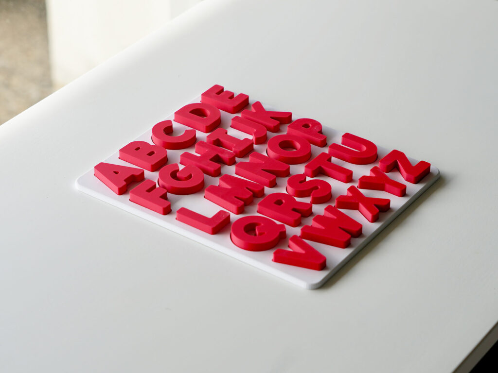 Completed uppercase alphabet puzzle – Australian-made educational toy for preschool letter recognition and phonics practice.